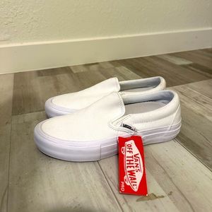 Vans pro white slip on